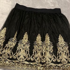 Women’s black and gold knee length skirt size 18/20